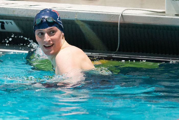 University of Pennsylvania swimmer Lia Thomas smiles after winning the 100-yard freestyle during the 2022 Ivy League Women’s Swimming and Diving Championships at Blodgett Pool on February 19, 2022, in Cambridge, Massachusetts.