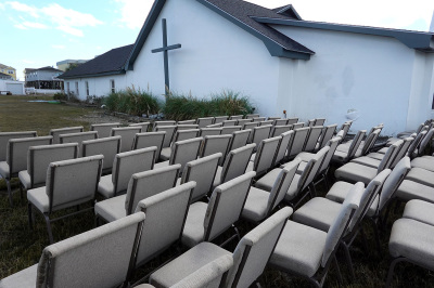Chairs sit outside of the Garden City Chapel and Retreat after the church was flooded during Hurricane Ian on Oct. 1, 2022, in Garden City Beach, South Carolina. Ian hit Florida as a category 4 storm causing widespread damage as it crossed the state before moving into the Atlantic and then hitting South Carolina as a category 1 storm near Pawleys Island.