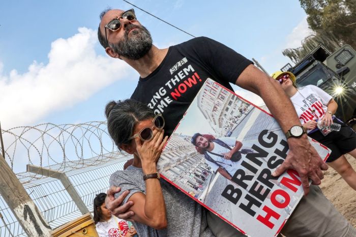 Jonathan Polin and Rachel Goldberg, parents of Israeli hostage Hersh Goldberg-Polin, attend a demonstration by the families of the hostages taken captive in the Gaza Strip since the Oct. 7, 2023, attacks by Palestinian militants calling for the hostages' release, near Kibbutz Nirim in southern Israel by the border with Gaza on August 29, 2024 amid the ongoing conflict in the Palestinian territory between Israel and Hamas.
